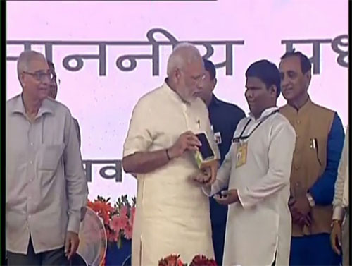 LG K7 smartphones distributed at Samajik Adikarita Shivir, Navsari